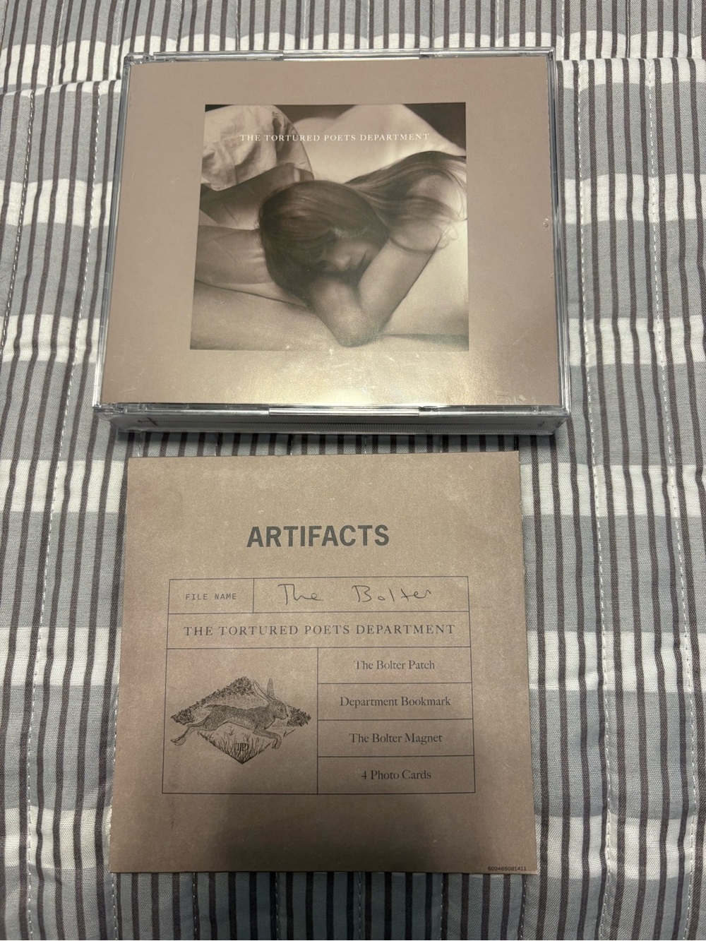Taylor Swift TTPD The Bolter CD with the artifacts.